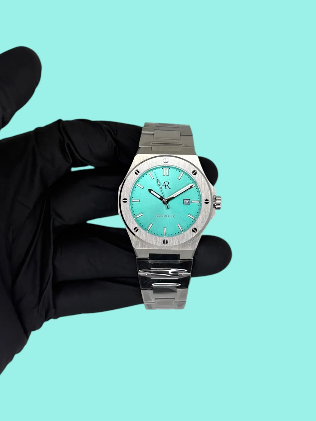 Silver/Blue turquoise dial Mansa - from ASOROCK WATCHES  a black african american owned luxury unique watch brand with swiss rolex, Audemars Piguet, patek homage inspired style watches. Also a custom vvs moissanite diamond watch maker.