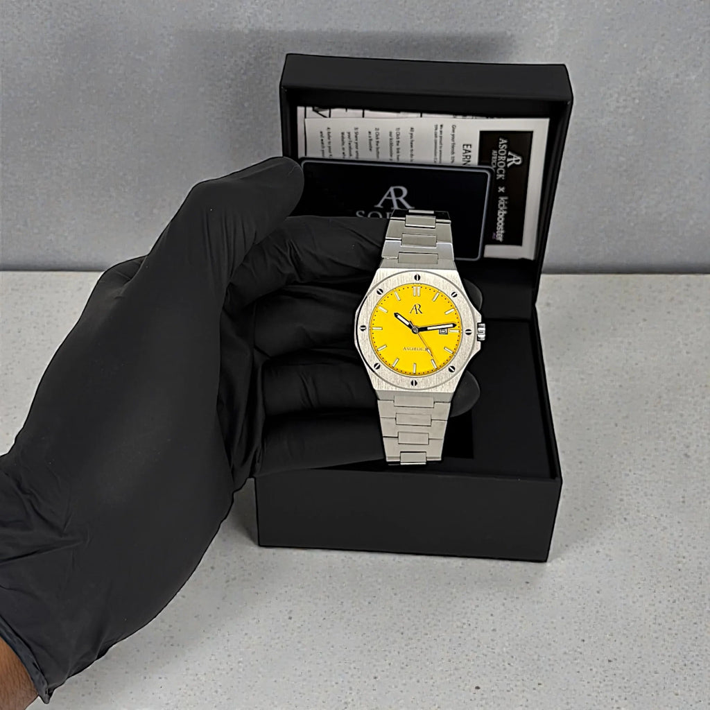 Silver/yellow Mansa - from ASOROCK WATCHES  a black african american owned luxury unique watch brand with swiss rolex, Audemars Piguet, patek homage inspired style watches. Also a custom vvs moissanite diamond watch maker.