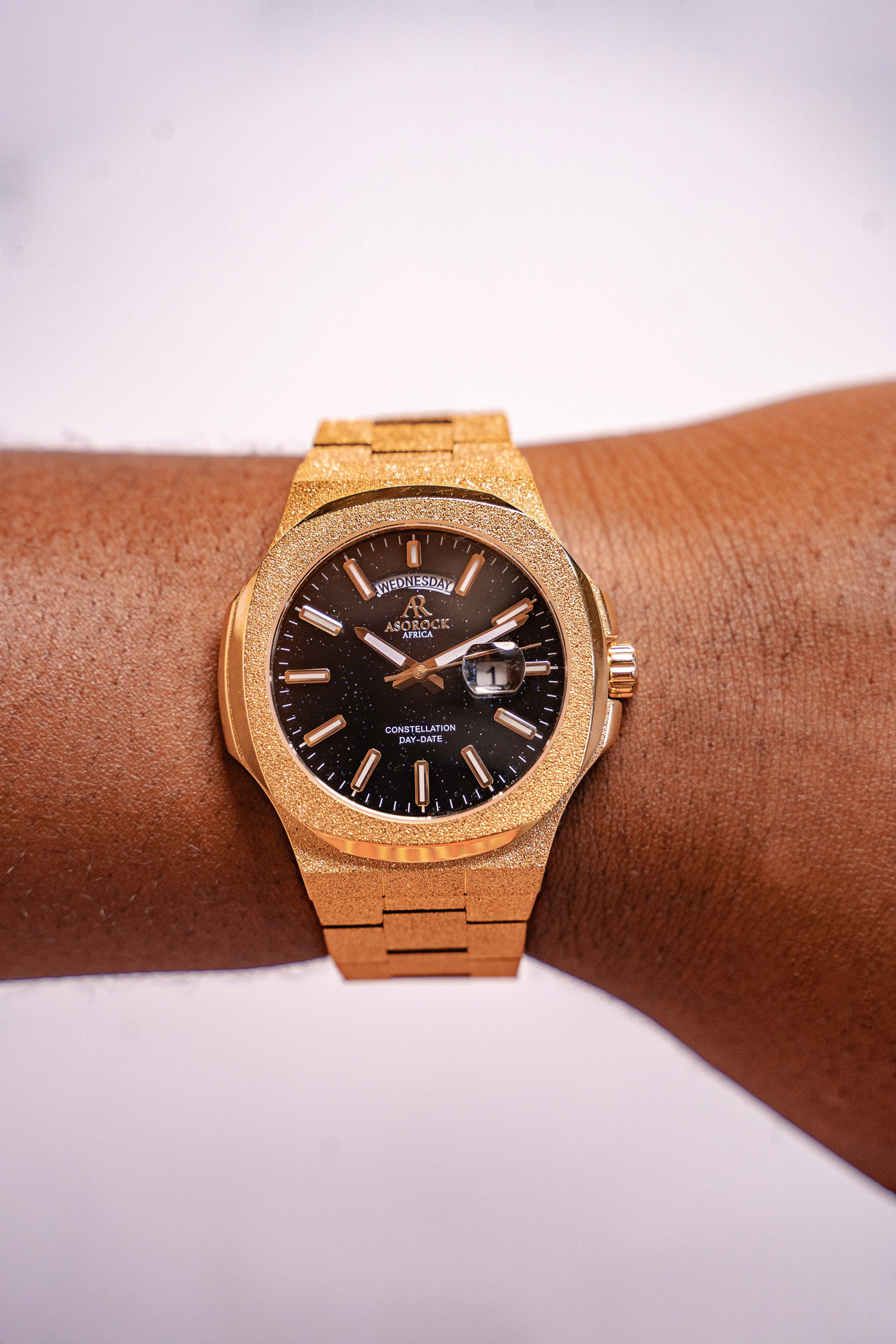 Gold/Black Frosted Stardust Constellation Day Date - from ASOROCK WATCHES  a black african american owned luxury unique watch brand with swiss rolex, Audemars Piguet, patek homage inspired style watches. Also a custom vvs moissanite diamond watch maker. 