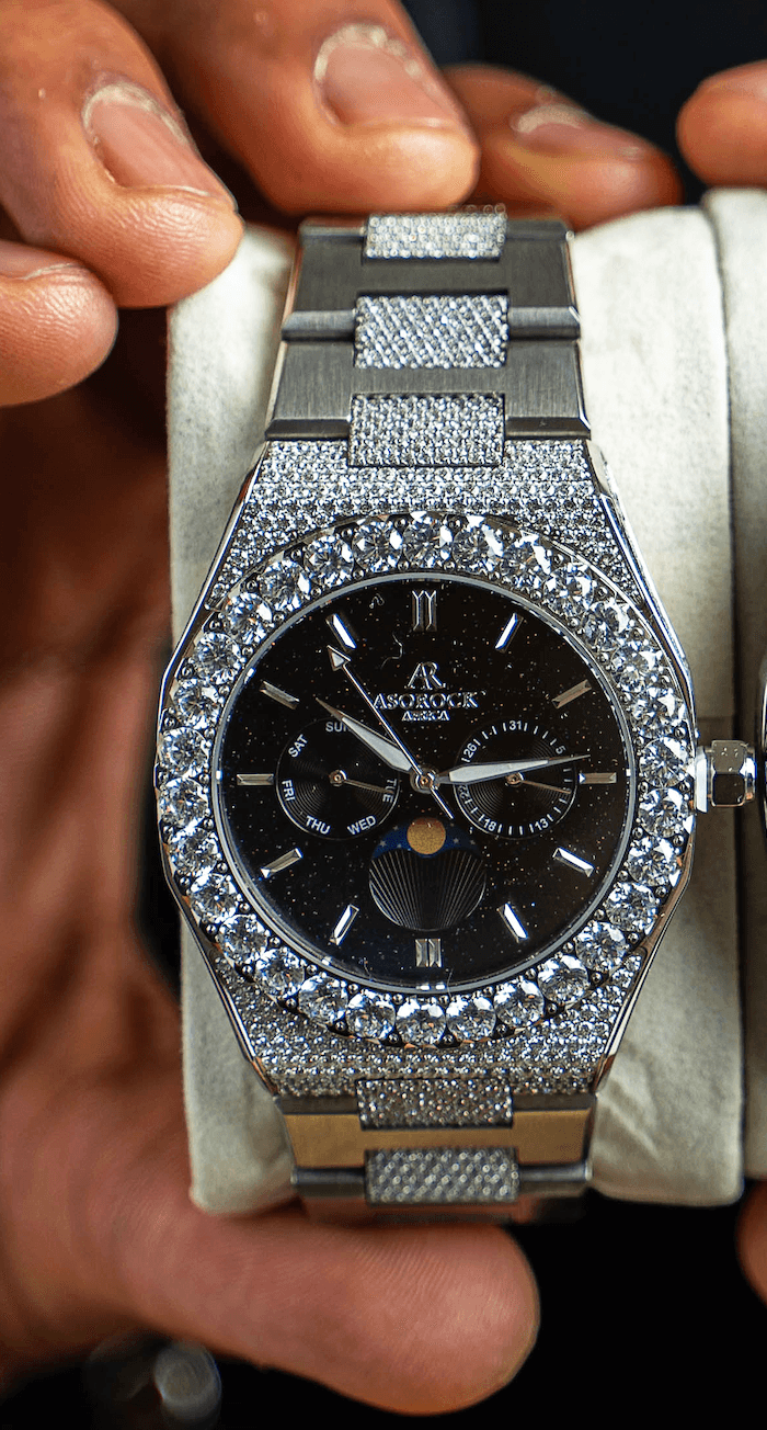 Iced transporter - Small diamond bezel - Half iced strap - from ASOROCK WATCHES  a black african american owned luxury unique watch brand with swiss rolex, Audemars Piguet, patek homage inspired style watches. Also a custom vvs moissanite diamond watch maker. 